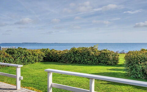 Edla - 35M from the Sea: Sky, Furniture, Wood, Outdoor Furniture, Table, Chair, Cloud, Outdoor Table, Hardwood, Plank