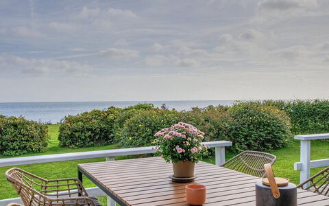 Edla - 35M from the Sea: Sky, Furniture, Wood, Outdoor Furniture, Table, Chair, Cloud, Outdoor Table, Hardwood, Plank