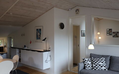 Momo - 2.8Km from the Sea: Furniture, Flooring, Wall, Interior Design, Floor, Wood, Ceiling, Room, Couch, Light Fixture