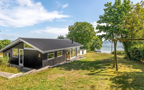 Stefan - 50M from the Sea: Roof, House, Home, Cottage, Door, Siding, Deck, Porch, Plank, Hardwood