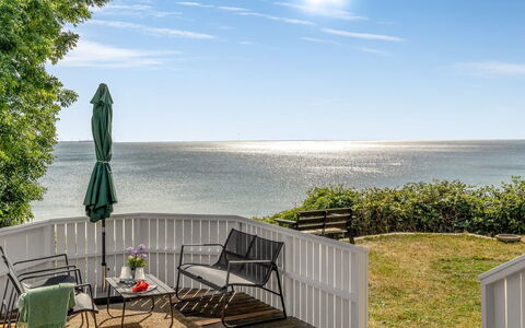 Stefan - 50M from the Sea: Furniture, Outdoor Furniture, Sea, Coastal And Oceanic Landforms, Coast, Ocean, Shade, Deck, Fence, Chair