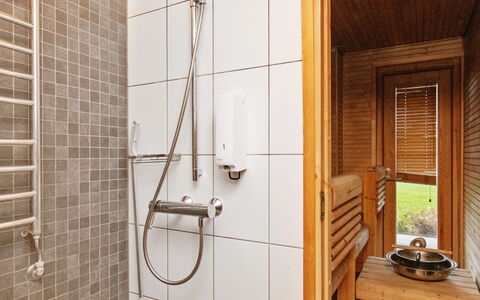 Villa Sinikka 1: Flooring, Wood, Floor, Plumbing Fixture, Interior Design, Bathroom, Plumbing, Shower, Room, Shower Head
