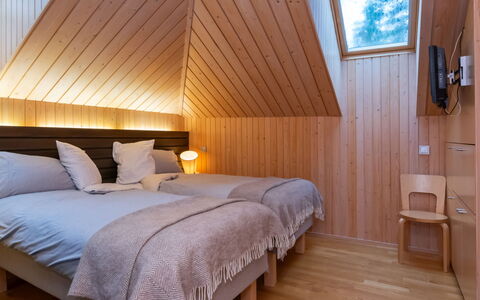 Villa Antti: Flooring, Floor, Interior Design, Wood, Ceiling, Bedroom, Bed, Wood Flooring, Furniture, Lighting