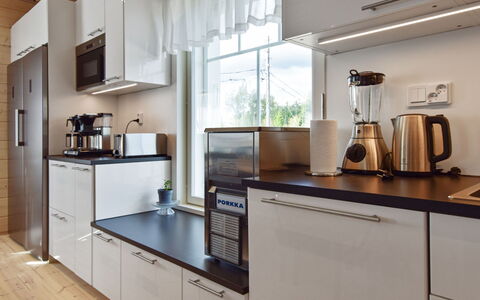 Villa Ruuska: Kitchen Appliance, Kitchen, Countertop, Cabinetry, Interior Design, Major Appliance, Furniture, Home Appliance, Flooring, Wood