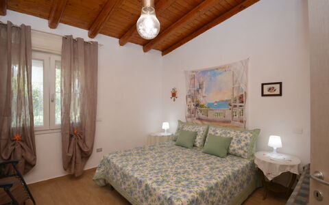 Villa Mameli: Furniture, Interior Design, Bed, Bedroom, Flooring, Floor, Wall, Bed Sheet, Bedding, Wood