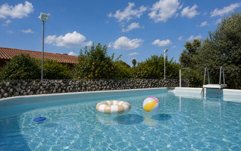 Villa Mameli: Blue, Swimming Pool, Outdoor Furniture, Composite Material, Resort, Leisure, Shade, Eco Hotel, Umbrella, Water Feature