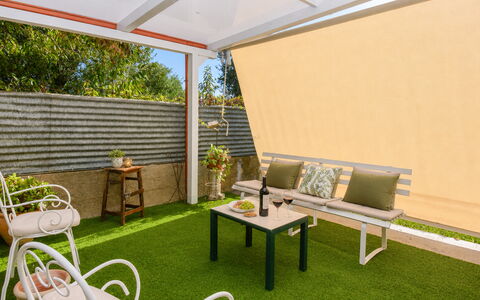 Villa Mameli: Furniture, Outdoor Furniture, Interior Design, Floor, Chair, Patio, Shade, Hardwood, Wood Stain, Houseplant