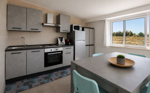 Villa Giugiola: Furniture, Kitchen, Countertop, Flooring, Interior Design, Floor, Major Appliance, Cabinetry, Home, Kitchen Appliance