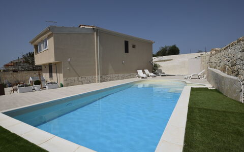 Villa Giugiola: Swimming Pool, Residential Area, Composite Material, Resort, Concrete, Shade, Estate, Outdoor Furniture, Hotel, Water Feature