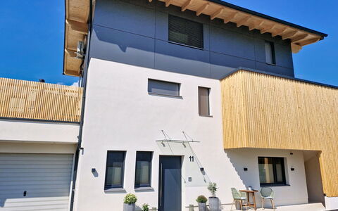 A3: Building, Facade, Architecture, Residential Area, Home, Urban Design, Composite Material, Siding, Slope, Paint
