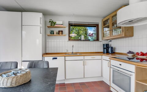 Tjerk - 900M from the Sea: Kitchen, Flooring, Countertop, Interior Design, Kitchen Appliance, Wood, Floor, Cabinetry, Furniture, Major Appliance