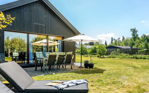 Tjerk - 900M from the Sea: Roof, House, Home, Cottage, Door, Siding, Deck, Porch, Plank, Hardwood