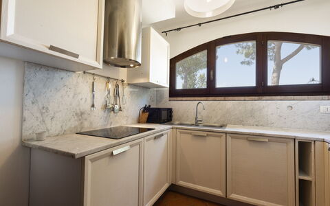 Villa Quintino: Kitchen, Countertop, Interior Design, Kitchen Sink, Wood, Flooring, Kitchen Appliance, Sink, Furniture, Major Appliance