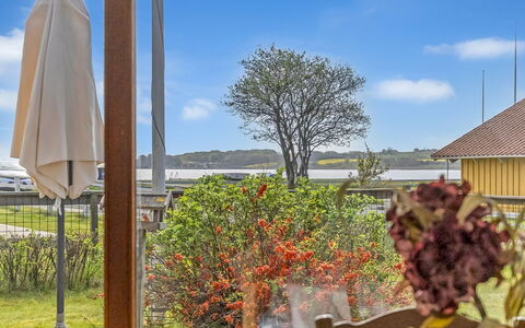 Wrange - 100M to the Fjord: Shrub, House, Residential Area, Home, Garden, Shade, Yard, Courtyard, Flowerpot
