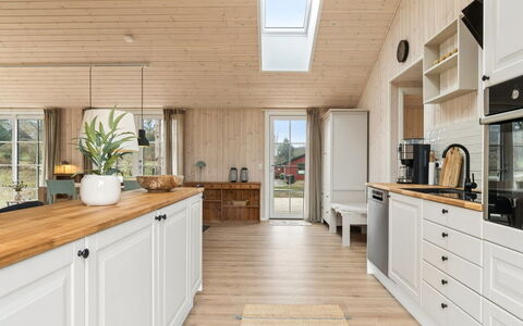 Martta - 250M from the Sea: Kitchen, Flooring, Wood, Countertop, Furniture, Interior Design, Floor, Cabinetry, Ceiling, Wood Flooring