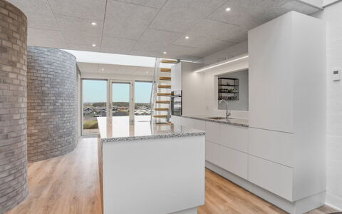 Eicke - 20M from the Sea: Flooring, Wood, Ceiling, Floor, Interior Design, Kitchen, Countertop, Light Fixture, Wood Flooring, Cabinetry