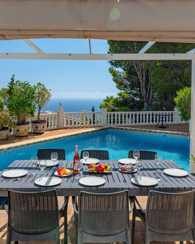 Preciados: Furniture, Outdoor Furniture, Chair, Table, Swimming Pool, Kitchen & Dining Room Table, Resort, Outdoor Table, Shade, Umbrella
