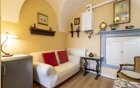 La Quiete: Furniture, Interior Design, Wall, Flooring, Wood, Floor, Room, Living Room, Couch, Lighting