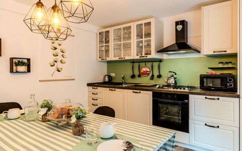La Casetta di Lulù: Furniture, Interior Design, Kitchen, Countertop, Light Fixture, Wood, Flooring, Ceiling, Room, Kitchen Appliance