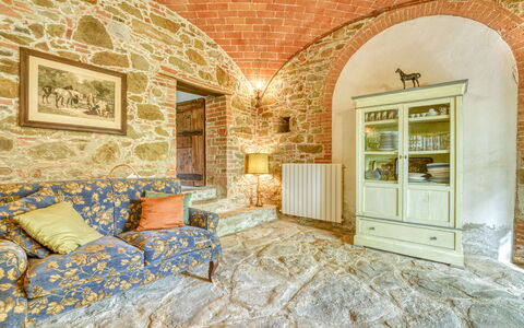 Villa the Horses: Furniture, Wall, Interior Design, Ceiling, Flooring, Floor, Lighting, Room, Couch, Living Room