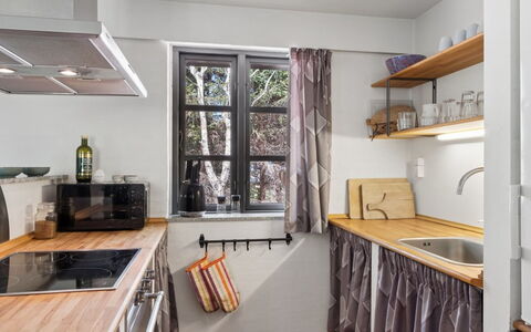 Thorvor - 900M from the Sea: Kitchen, Interior Design, Wood, Furniture, Countertop, Flooring, Kitchen Appliance, Room, Ceiling, Lighting