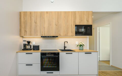 Saariselän Aavahelmi C: Kitchen, Kitchen Appliance, Countertop, Cabinetry, Interior Design, Wood, Major Appliance, Flooring, Furniture, Cupboard