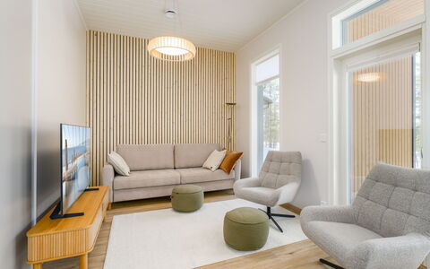 Saariselän Aavahelmi C: Furniture, Interior Design, Floor, Flooring, Couch, Living Room, Wood Flooring, Wall, Wood, Chair