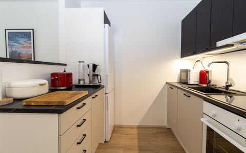 Lomapesä: Kitchen, Kitchen Appliance, Countertop, Cabinetry, Interior Design, Major Appliance, Furniture, Flooring, Wood, Kitchen Stove