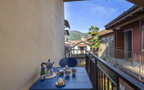 La Giuseppina: Facade, Town, Residential Area, Home, Urban Design, Balcony, Apartment, Porch, Houseplant, Flowerpot