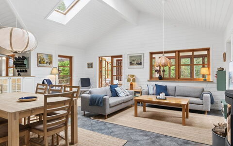Pertti - 625M from the Sea: Furniture, Couch, Interior Design, Flooring, Wood, Living Room, Ceiling, Floor, Table, Room