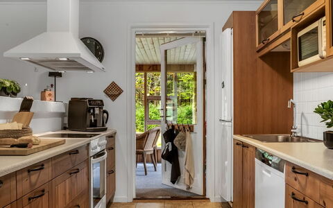 Linnea - from the Sea: Kitchen, Countertop, Cabinetry, Furniture, Kitchen Appliance, Flooring, Interior Design, Wood, Major Appliance, Floor