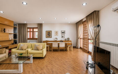 Villa Billona: Furniture, Interior Design, Flooring, Floor, Couch, Wood, Ceiling, Room, Living Room, Table