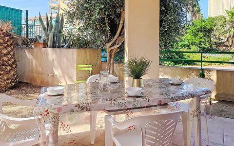 Nautica: Furniture, Chair, Outdoor Furniture, Table, Outdoor Table, Kitchen & Dining Room Table, Shade, Garden, Patio, Restaurant