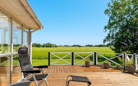 Saku - 375M from the Sea: Sky, Porch, Land Lot, Deck, Chair, Outdoor Furniture, Shade, Cottage, Hardwood, Outdoor Structure