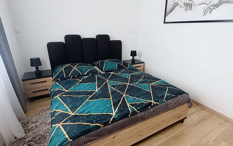 Korzo: Bed, Bedroom, Furniture, Bedding, Flooring, Bed Sheet, Wood, Floor, Interior Design, Linens