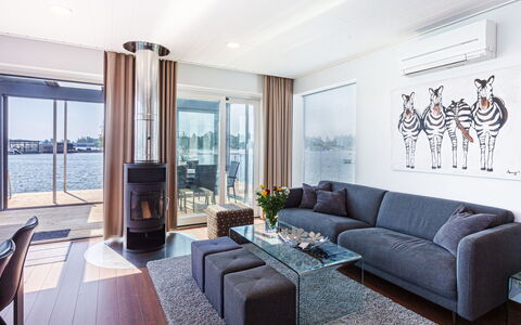 Villa Helmi: Furniture, Interior Design, Couch, Flooring, Ceiling, Living Room, Floor, Home, Lighting, Apartment