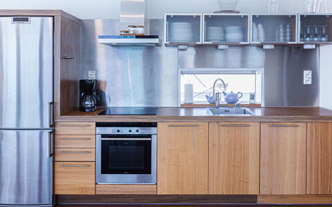 Villa Helmi: Kitchen Appliance, Wood, Kitchen, Major Appliance, Flooring, Interior Design, Furniture, Countertop, Home Appliance, Cabinetry