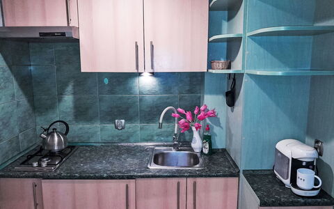 Przy Klifie: Kitchen, Kitchen Appliance, Countertop, Major Appliance, Kitchen Sink, Plumbing Fixture, Cabinetry, Tap, Sink, Interior Design