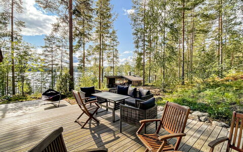 Villa Underberg: Wood, Deck, Cottage, Hardwood, Eco Hotel, Chair, Porch, Shade, Outdoor Furniture, Garden