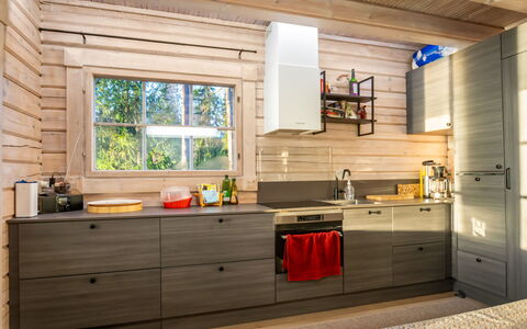 Villa Karmu: Kitchen, Flooring, Wood, Countertop, Furniture, Interior Design, Kitchen Appliance, Cabinetry, Major Appliance, Floor