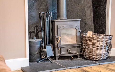 Dalnaglar Cottage: Flooring, Hearth, Furniture, Floor, Wood-Burning Stove, Wood Flooring, Living Room, Natural Material, Hardwood