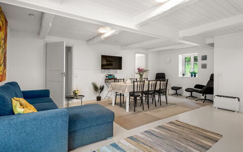 Chrissie - 3Km from the Sea: Furniture, Interior Design, Flooring, Couch, Floor, Wall, Ceiling, Wood, Living Room, Room