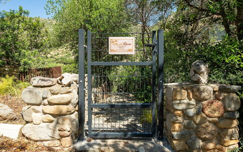Villa sulla Roccia: Rock, Gate, Shrub, Stone Wall, Garden, Fence, Landscaping, Trail, Flagstone, Home Fencing
