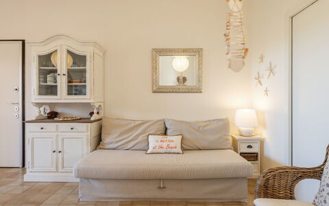 Serena: Furniture, Interior Design, Couch, Flooring, Room, Floor, Wood, Living Room, Lighting, Textile