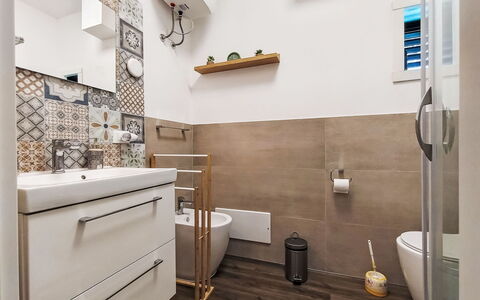 Last Sun Roccella: Flooring, Plumbing Fixture, Bathroom, Interior Design, Floor, Sink, Bathroom Sink, Toilet, Tap, Toilet Seat