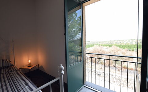 Villa Chiaramonte Gulfi: Furniture, Floor, Iron, Chair, Metal, Glass, Balcony, Wood Stain, Hardwood, Bedroom