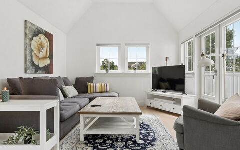 Franka - 1.1Km from the Sea: Furniture, Interior Design, Couch, Flooring, Floor, Living Room, Wood, Ceiling, Room, Wood Flooring