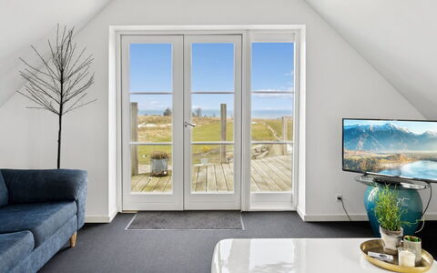 Carola - 1Km from the Sea: Wood, Flooring, Floor, Interior Design, Furniture, Room, Ceiling, Living Room, Chair