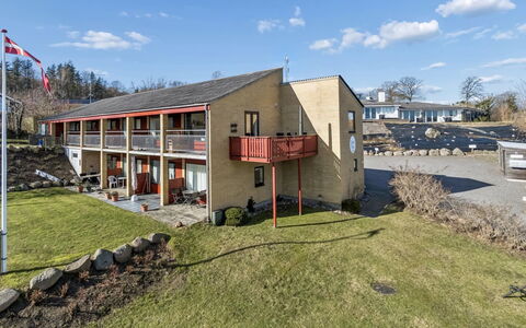 Amilia - 100M from the Sea: Vegetation, Shrub, Spring, Cottage, Garden, Shade, Backyard, Yard, Chair