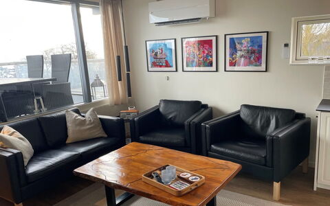 Evalina - 150M from the Sea: Furniture, Interior Design, Couch, Flooring, Wood, Floor, Living Room, Room, Lighting, Brown